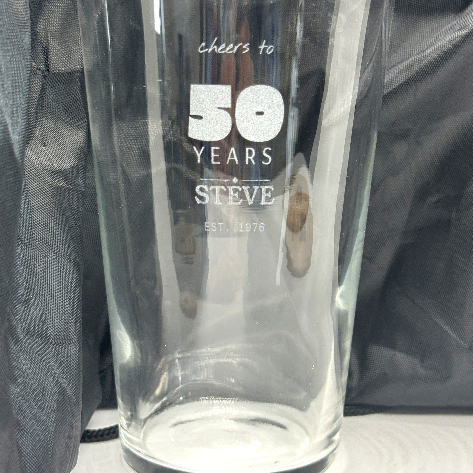 Close-up of laser engraving on the pint glass
