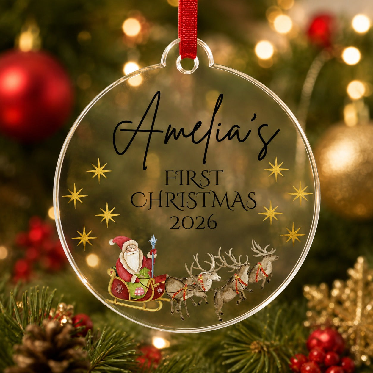 Personalised first Christmas Santa sleigh bauble with name Amelia and year 2026 on clear acrylic