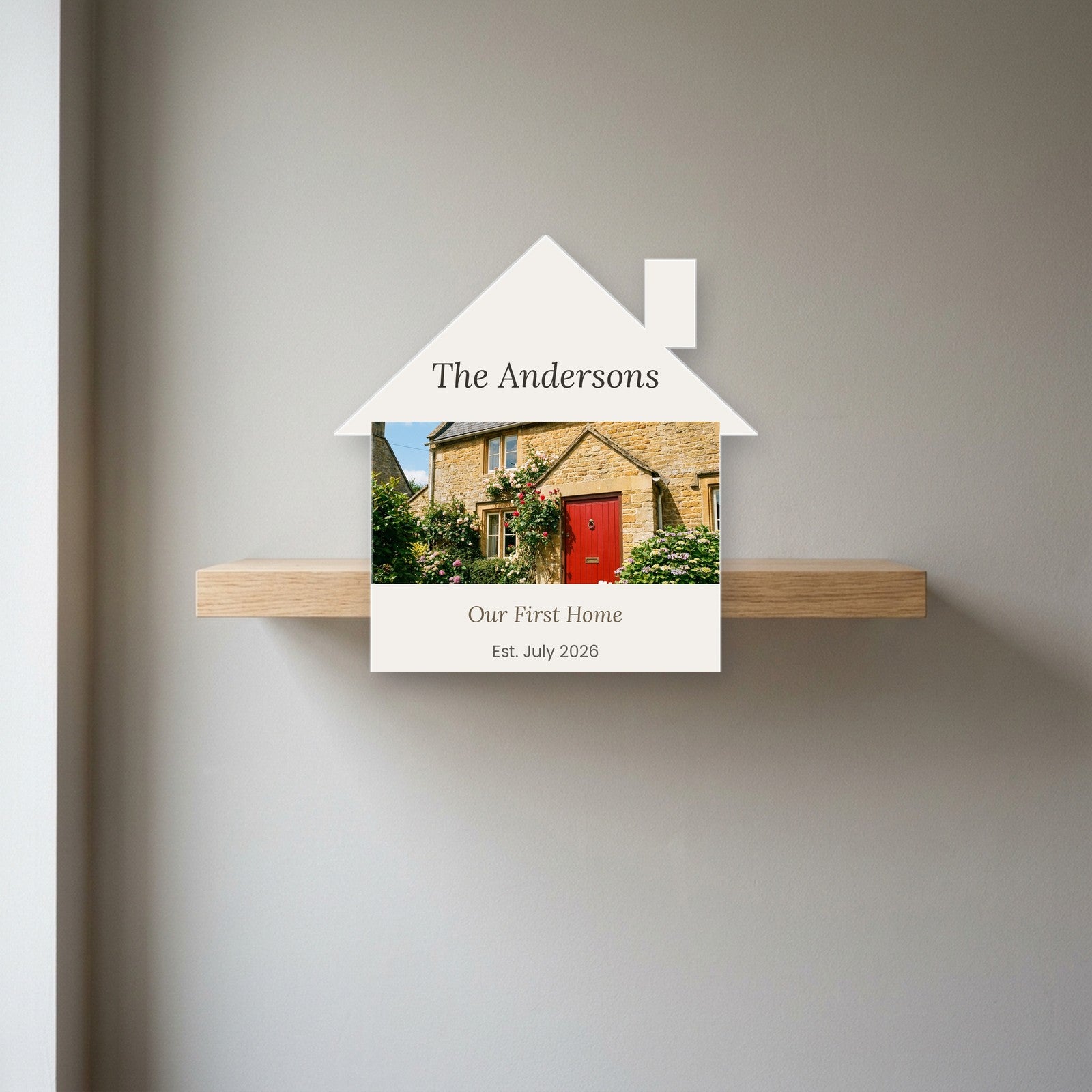 New home photo block displayed on a shelf