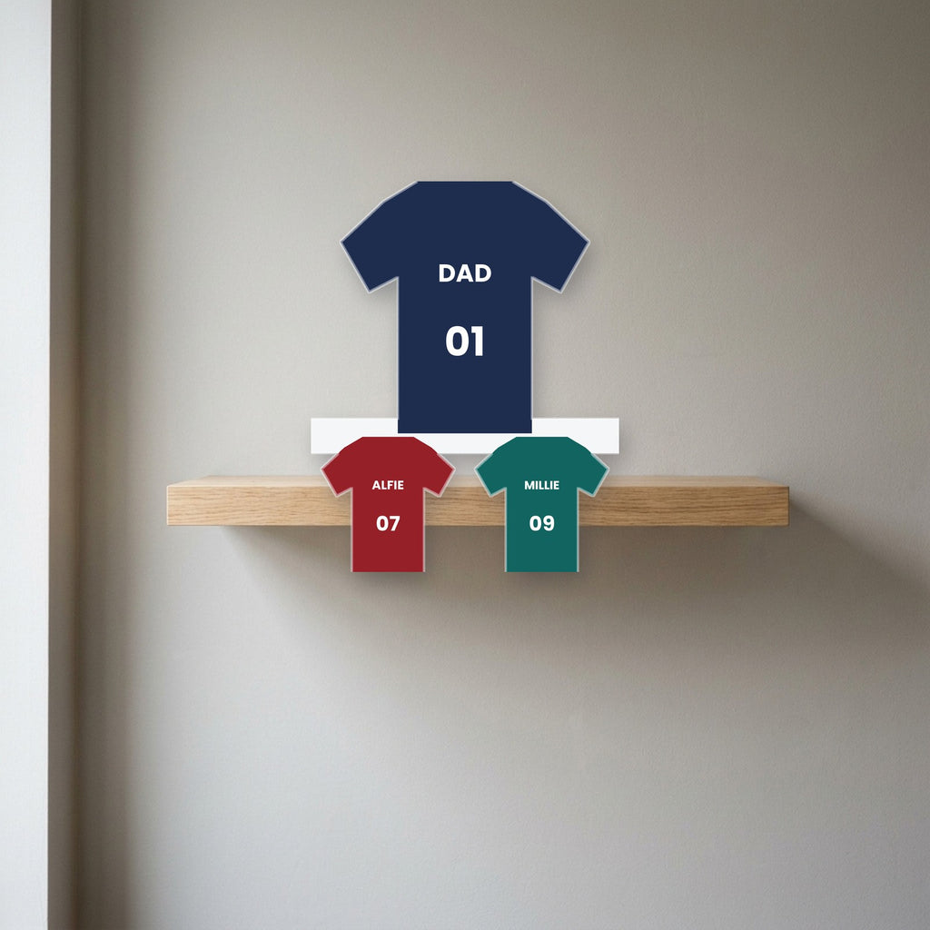 Football shirts photo block displayed on a shelf