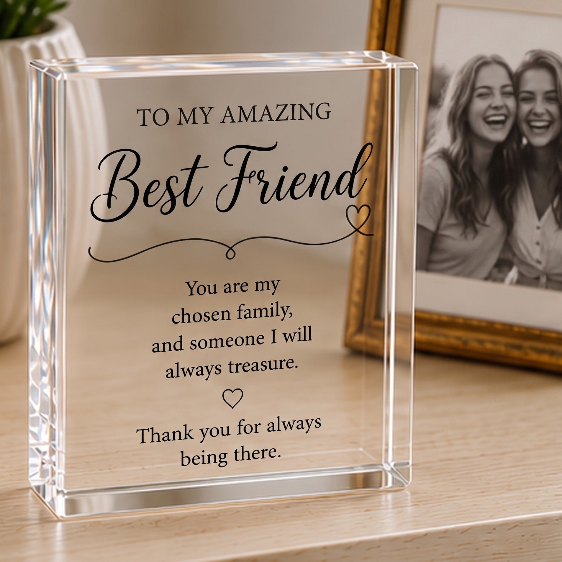 Best Friend acrylic keepsake block styled on a sideboard beside a framed photo of two friends