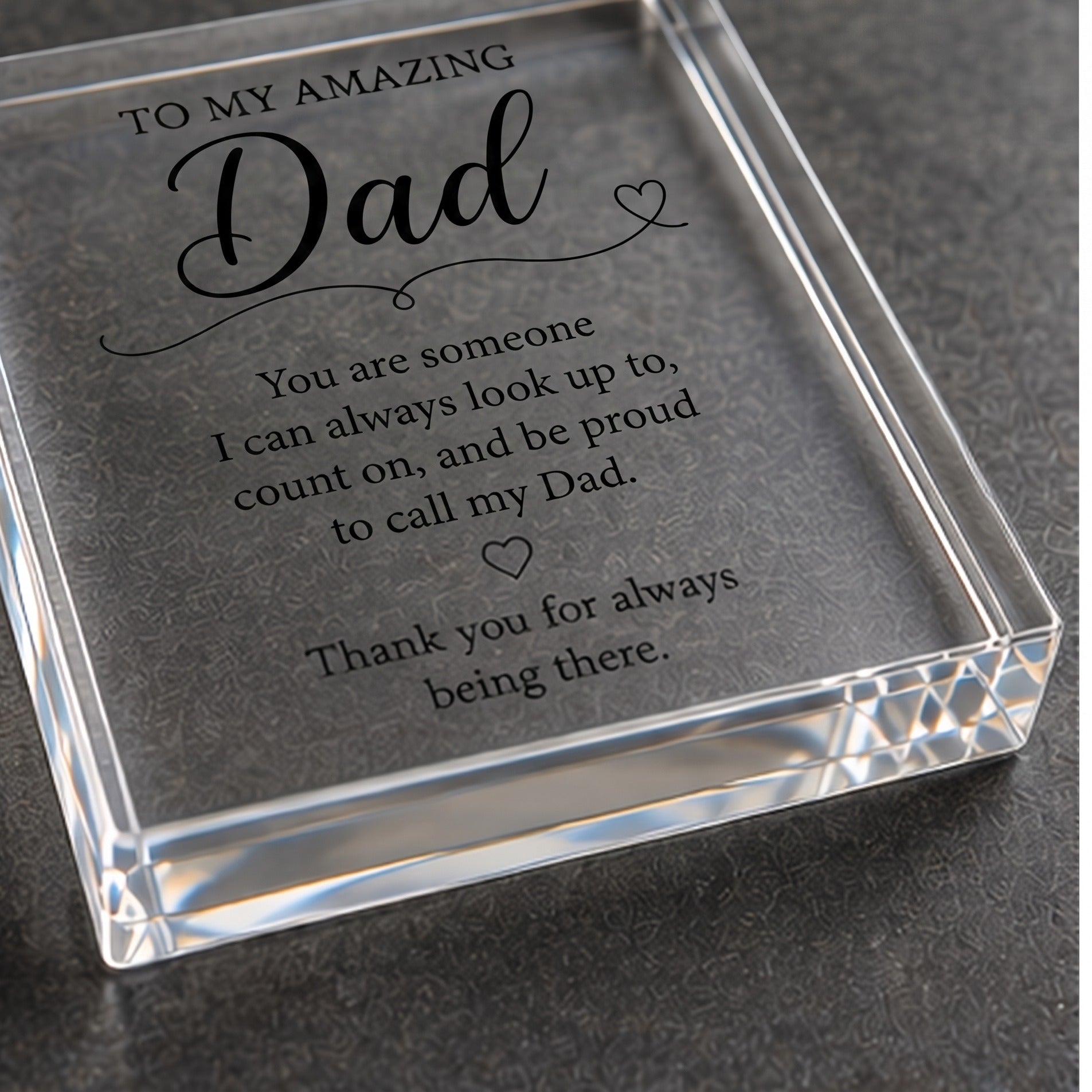 Angled detail view of the clear acrylic Dad keepsake block