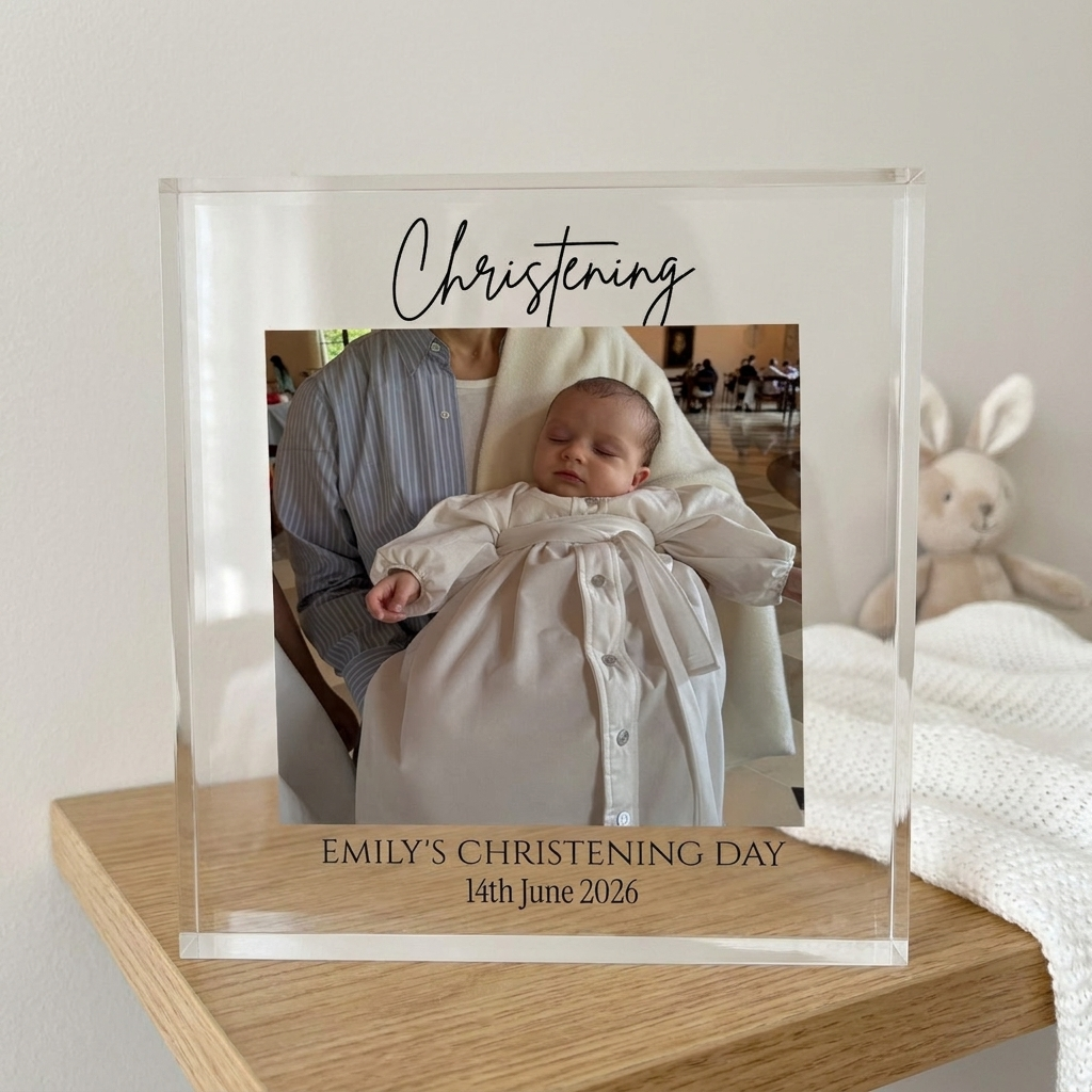 Personalised christening acrylic photo block on a nursery shelf