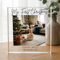 Personalised baby's first Christmas clear acrylic photo block on oak table