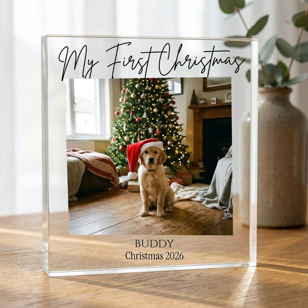 Personalised dog's first Christmas clear acrylic photo block on oak table