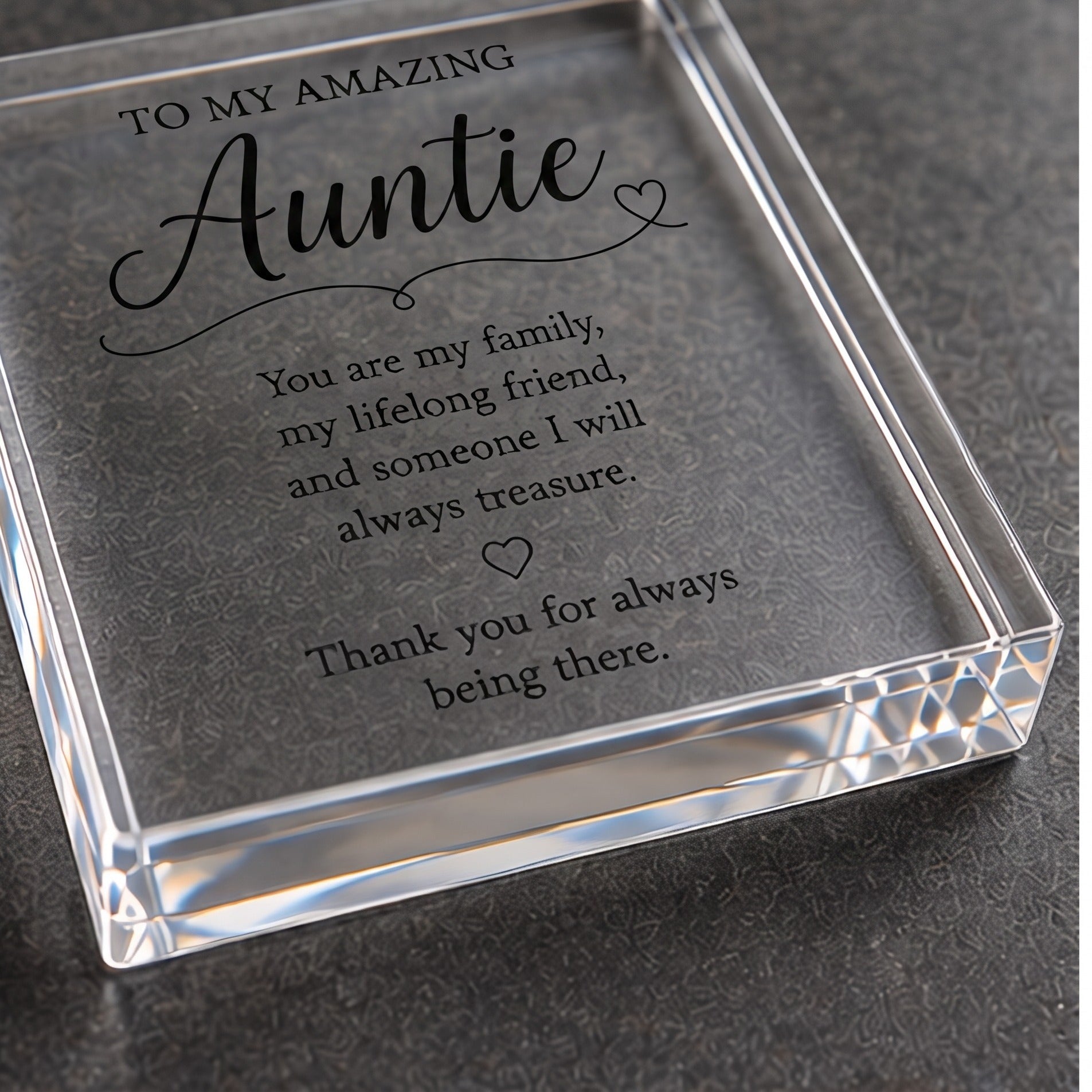 Angled detail view of the clear acrylic Auntie keepsake block