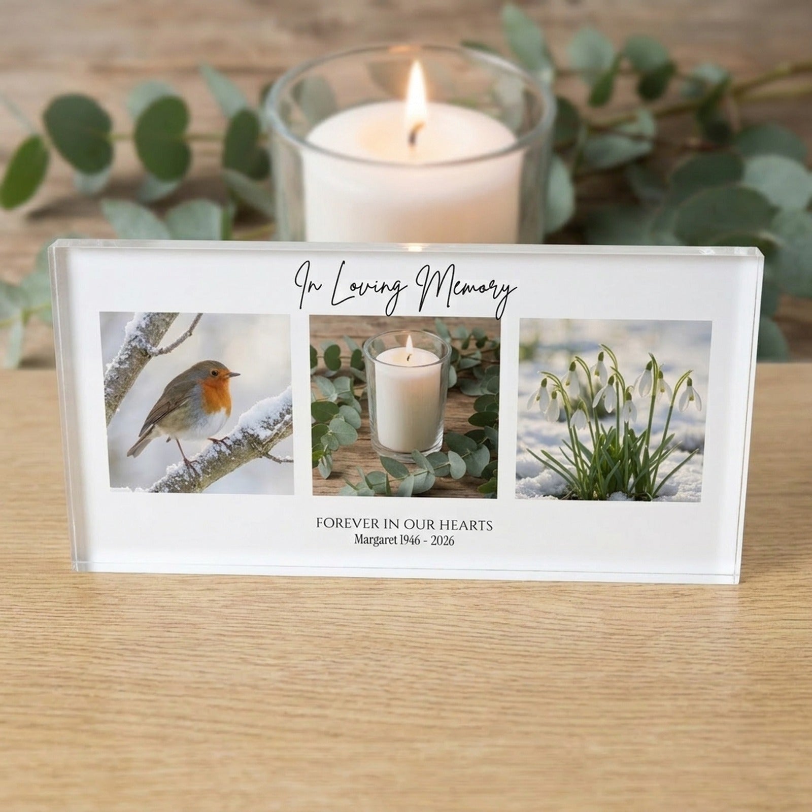 Memorial photo collage acrylic block displayed with a candle and eucalyptus