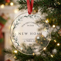 Personalised first Christmas in our new home acrylic bauble with address and year hanging on a Christmas tree