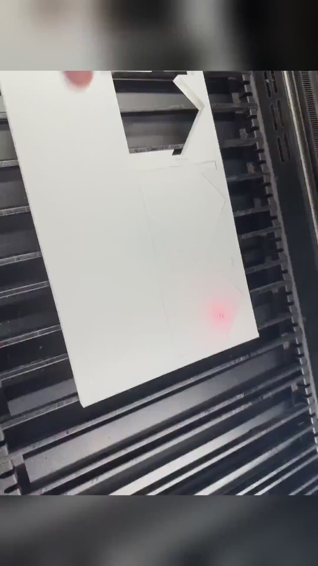 Acrylic house shape WiFi QR sign being laser cut